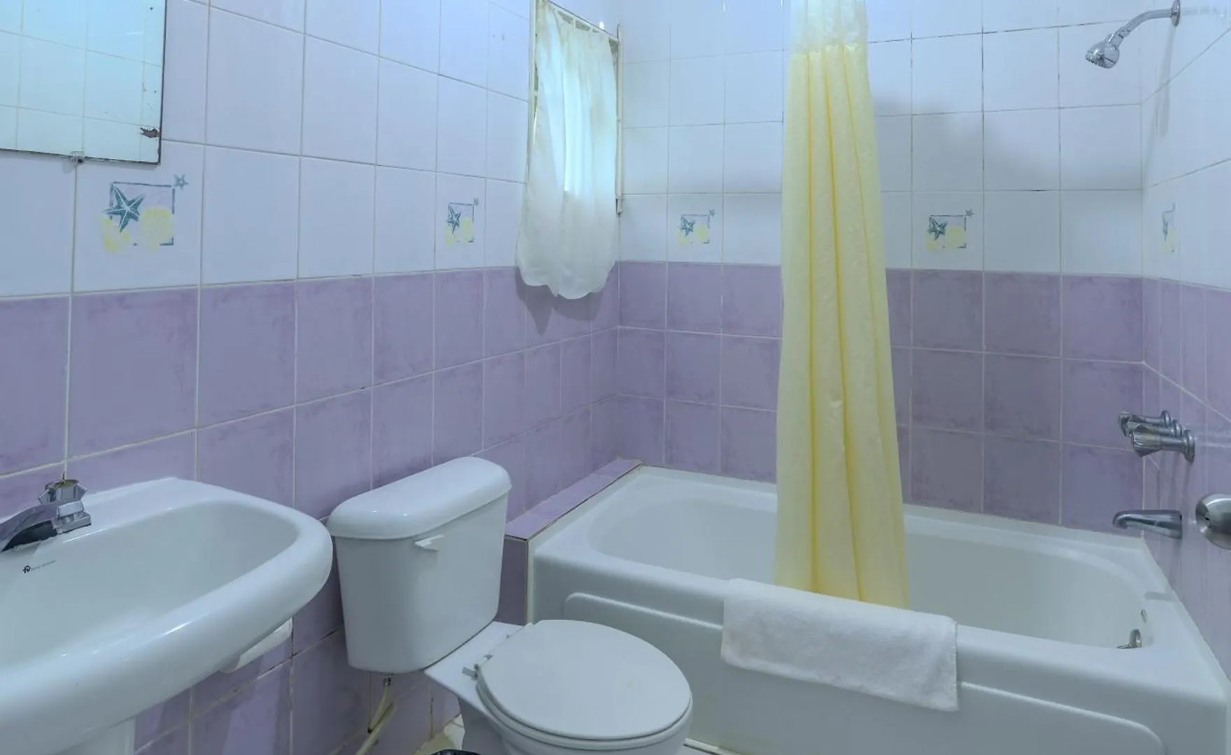 Отель Tamboo Resort Негрил